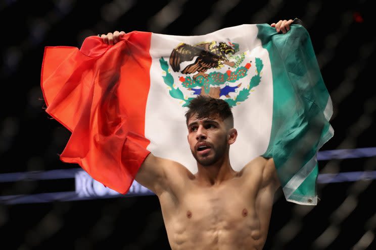 Yair Rodriguez celebrates his second-round TKO over B.J. Penn Sunday in Phoenix. (Getty Images)