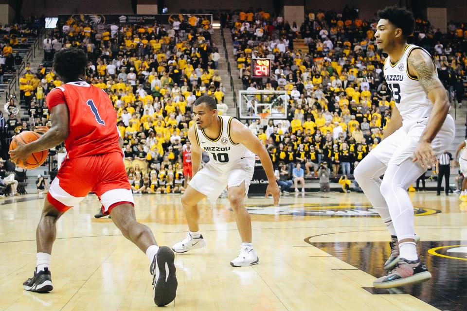 Missouri's Nick Honor (1) defends Southern Indiana's Isaiah Swope (1) during the Tigers' 97-91 win over Southern Indiana on Nov. 7, 2022, at Mizzou Arena.