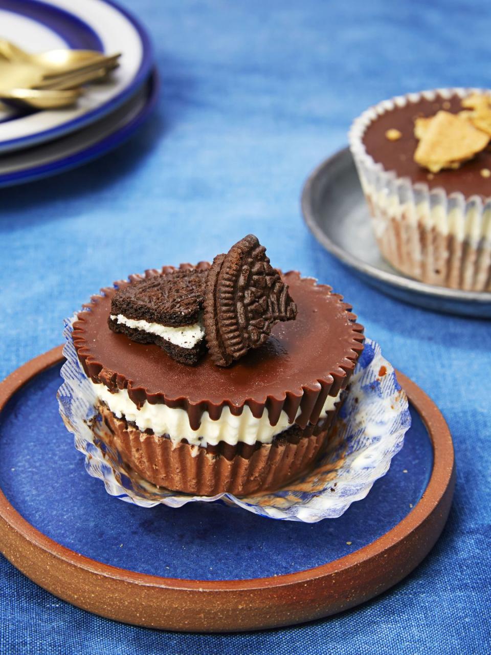 <p>Keep this cool, no-bake option in mind for when the thermometer reads 90° or above. We used Oreos in our miniature ice cream cakes, but feel free to get creative with pretzels, sugar cones, vanilla wafers, you name it! <em><br></em></p><p><a href="https://www.goodhousekeeping.com/food-recipes/a32709/ice-cream-cupcakes/" rel="nofollow noopener" target="_blank" data-ylk="slk:Get the recipe for Ice Cream Cupcakes »;elm:context_link;itc:0;sec:content-canvas" class="link "><em>Get the recipe for Ice Cream Cupcakes »</em></a> </p>