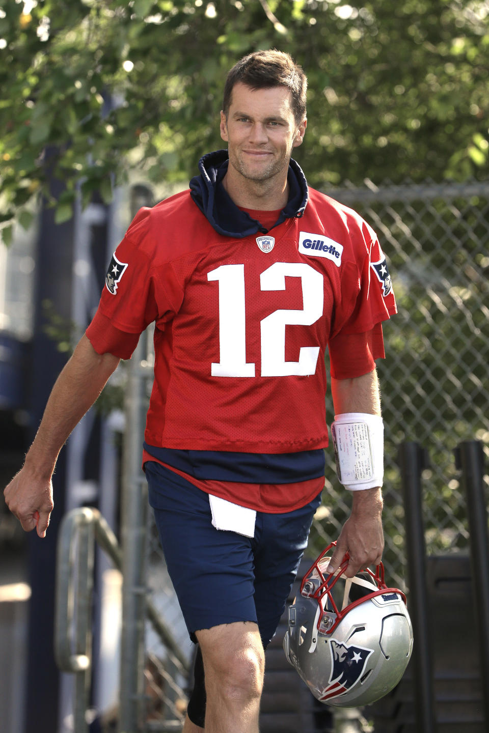 New England Patriots quarterback Tom Brady steps on the field at the start of an NFL football training camp practice, Thursday, July 25, 2019, in Foxborough, Mass. (AP Photo/Steven Senne)