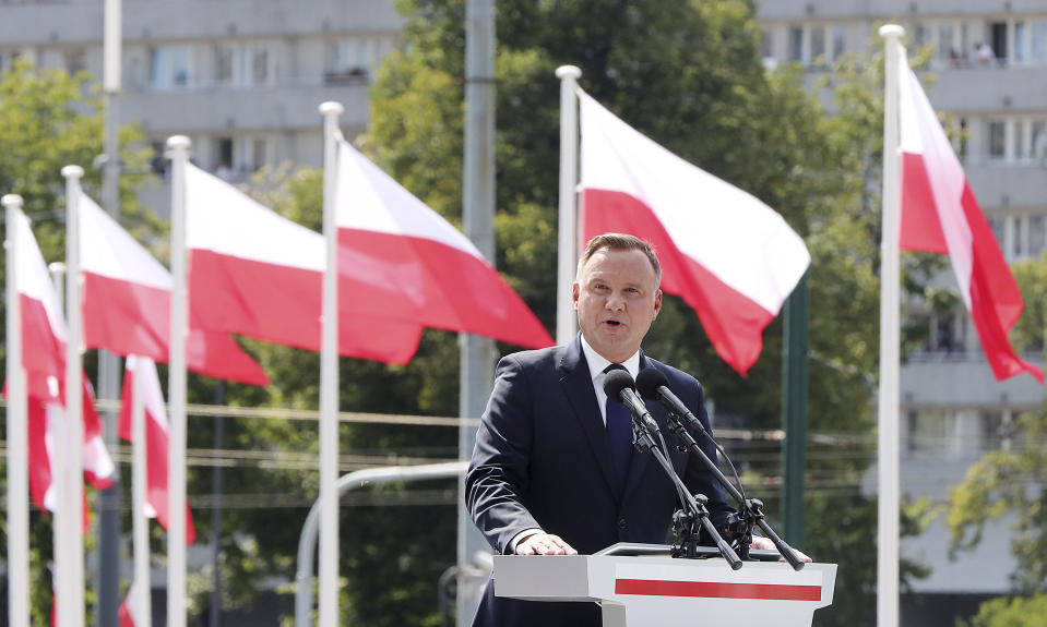 Poland's president Andrzej Duda, gives an address during the annual Armed Forces review during a national holiday, in Katowice, Poland, Thursday, Aug. 15, 2019. Large crowds turned out for the celebration which this year included a fly-over by two U.S. F-15 fighter jets. (AP Photo/Czarek Sokolowski)