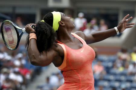 Serena Williams of the U.S. serves to Kiki Bertens of the Netherlands during their match at the U.S. Open Championships tennis tournament in New York, September 2, 2015. REUTERS/Mike Segar