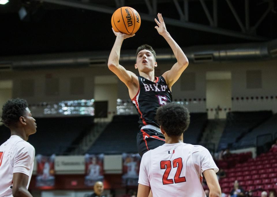 Bixby’s Parker Friedrichsen (5) shoots over Tulsa Union’s Trent Pierce on Feb. 8, 2022, in Tulsa.