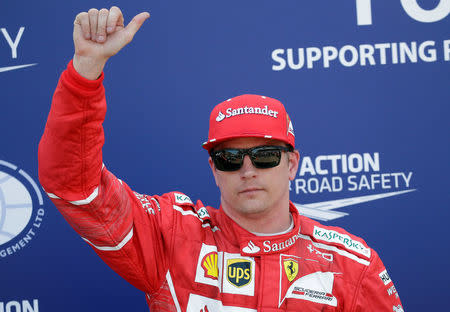 Formula One - F1 - Monaco Grand Prix - Monaco - 27/05/2017 - Ferrari's Kimi Raikkonen reacts after setting pole position in qualifying session. REUTERS/Max Rossi