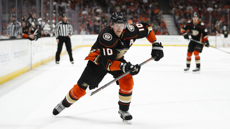 FILE - In this March 18, 2018, file photo, Anaheim Ducks' Corey Perry skates during the second period of an NHL hockey game against the New Jersey Devils, in Anaheim, Calif. The Anaheim Ducks have bought out the contract of former NHL MVP Corey Perry after 14 seasons with the franchise. The Ducks announced the move Wednesday, June 19, 2019. General manager Bob Murray called it "one of the most difficult decisions I've had to make in my 44 years in the NHL."(AP Photo/Jae C. Hong, File)