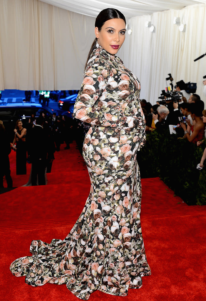 <b>Who:</b> Kim Kardashian<br><br> <b>Wearing:</b> The ugliest dress ... EVER<br><br> <b>Where:</b> 2013 Metropolitan Museum of Art's Costume Institute Gala in NYC