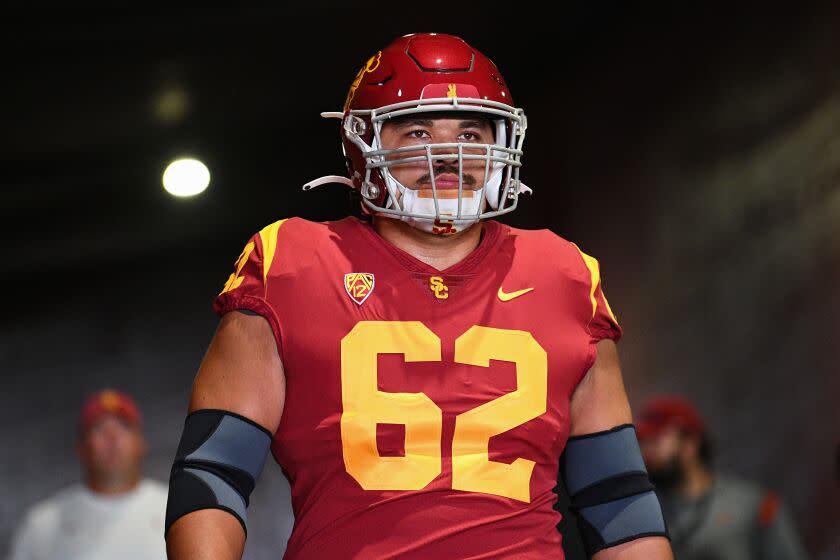 USC Trojans offensive lineman Brett Neilon (62) looks on before a college football game against Rice