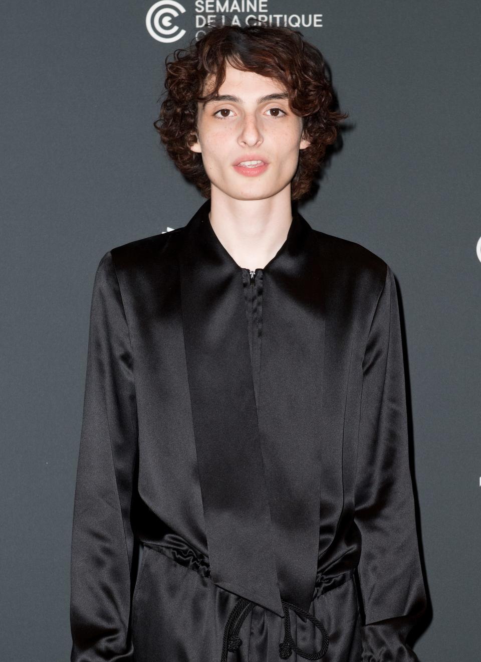 Finn Wolfhard in a silk outfit