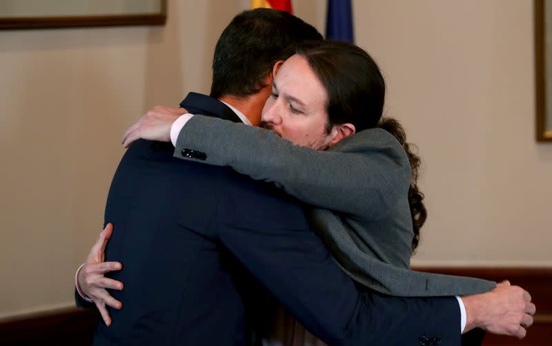 FILE PHOTO: Spain's acting PM Sanchez and Unidas Podemos leader Pablo Iglesias meet in Madrid