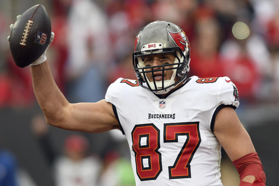 FILE - Tampa Bay Buccaneers tight end Rob Gronkowski (87) celebrates his touchdown against the Philadelphia Eagles during the second half of an NFL wild-card football game Sunday, Jan. 16, 2022, in Tampa, Fla. Four-time All-Pro tight end Rob Gronkowski announced his retirement again, Tuesday, June 21, 2022. (AP Photo/Jason Behnken, File)