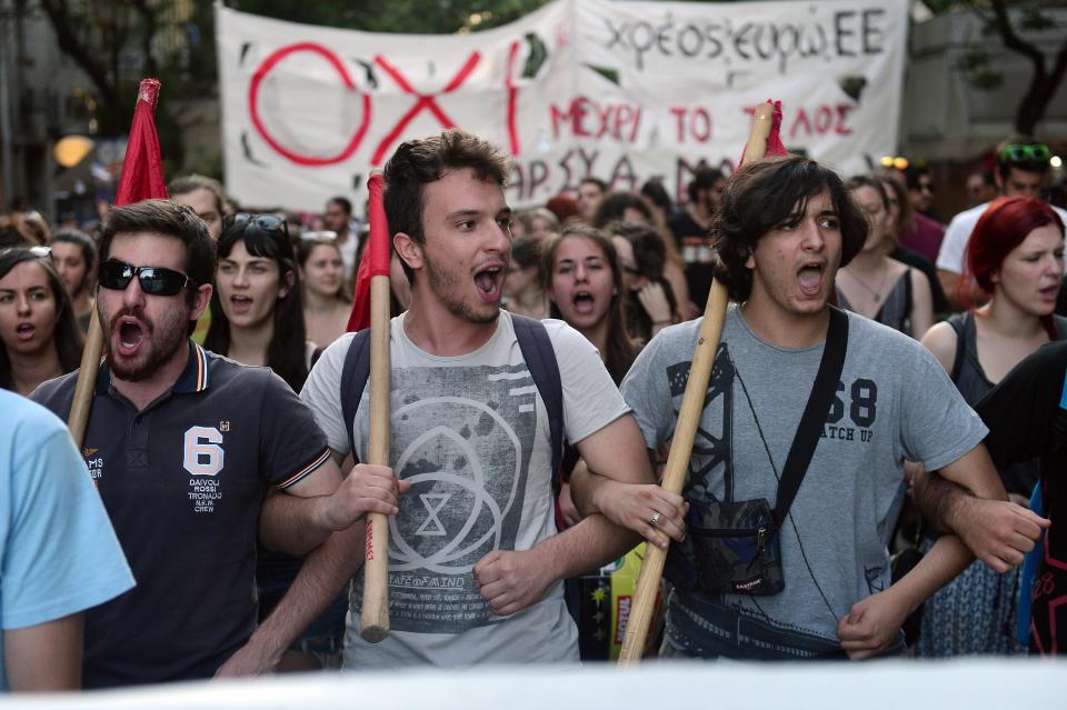 Youths chant slogans supporting the "no" vote for the upcoming referendum in Athens, Greece, on July 2, 2015.