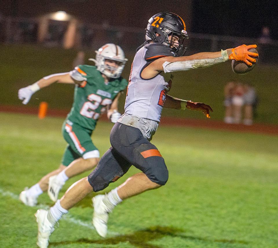 Wayland High School junior captain Max Dresens scores a touchdown against Hopkinton in the season opener, Sept. 8, 2023.