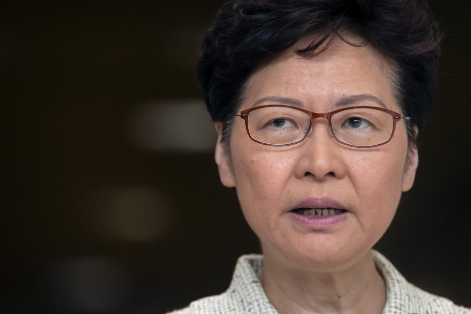 Hong Kong Chief Executive Carrie Lam speaks during a press conference at the government building in Hong Kong, Tuesday, Oct. 15, 2019. A homemade, remote-controlled bomb intended to "kill or to harm" riot control officers was detonated as they deployed against renewed violence in Hong Kong over the weekend, police said Monday, in a further escalation of destructive street battles gripping the business hub. (AP Photo/Mark Schiefelbein)