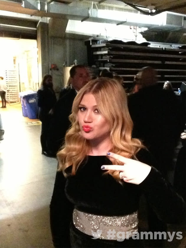 Backstage at the Grammys 2013: Kelly Clarkson had a great night – she not only performed, but she scooped an award too. Copyright [The Grammys]