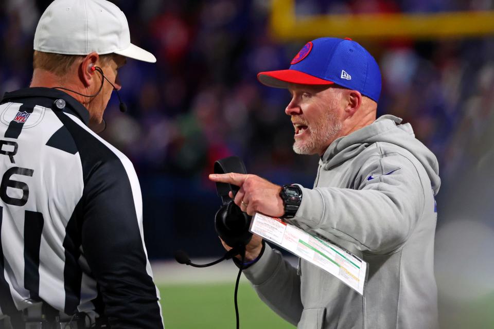 Buffalo Bills head coach Sean McDermott, right, talks with referee Alan Eck during the first half of an NFL football game against the New York Jets in Orchard Park, N.Y., Sunday, Nov. 19, 2023. (AP Photo/Jeffrey T. Barnes )