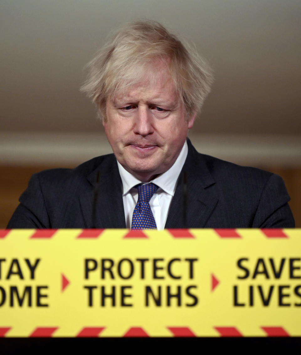 Britain's Prime Minister Boris Johnson speaks during a coronavirus press conference at 10 Downing Street in London, Friday Jan. 22, 2021. Johnson announced that the new variant of COVID-19, which was first discovered in the south of England, may be linked with an increase in the mortality rate. (Leon Neal/Pool via AP)