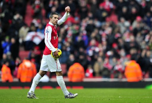 Robin van Persie, pictured here on February 4, has confirmed Arsenal's north London derby clash with Tottenham Hotspur will carry an extra edge by insisting it is a game Arsene Wenger's side simply cannot afford to lose