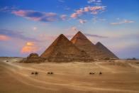 <p>Historians <a href="https://www.britannica.com/topic/Pyramids-of-Giza" rel="nofollow noopener" target="_blank" data-ylk="slk:estimate;elm:context_link;itc:0;sec:content-canvas" class="link ">estimate</a> that it took approximately 100,000 workers several decades to complete the Pyramids.</p>