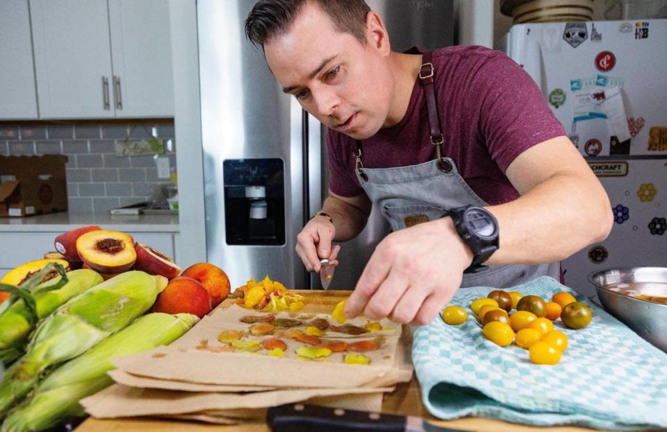 Boise chef Jonathon Merrick prepares food at his home kitchen on Tuesday, Aug. 16, 2022. Merrick is known for hosting pop-up dinners and sharing his love of food through his Tik Tok channel.