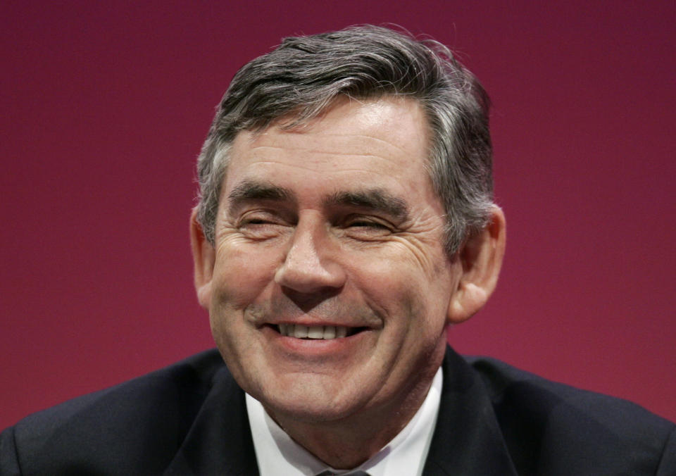 FILE - Britain's Prime Minister Gordon Brown smiles as he listens to a speech by Minister of Justice Jack Straw, not seen, during the second day of the Labour Party Conference, in Manchester, northern England, Sunday Sept. 21, 2008. Brown is among more than 1,000 people, including artist Tracey Emin, actress Imelda Staunton and Duran Duran singer Simon Le Bon, recognized Friday June 14, 2024 on the King’s Birthday Honors list, released to mark the British monarch’s official birthday. (AP Photo/Lefteris Pitarakis, File)