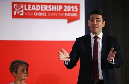 Labour Party leadership candidate Andy Burnham speaks as fellow candidate Yvett Cooper listens during a hustings event in Stevenage, Britain June 20, 2015. REUTERS/Darren Staples