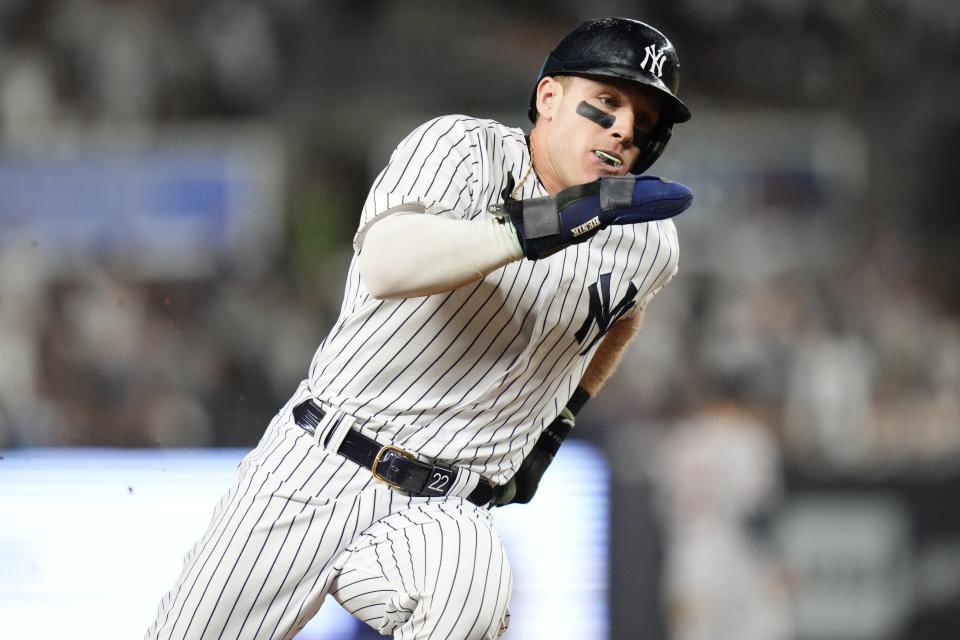 New York Yankees' Harrison Bader turns toward home plate to score on a single by Anthony Volpe during the sixth inning of a baseball game against the Houston Astros, Thursday, Aug. 3, 2023, in New York. (AP Photo/Frank Franklin II)