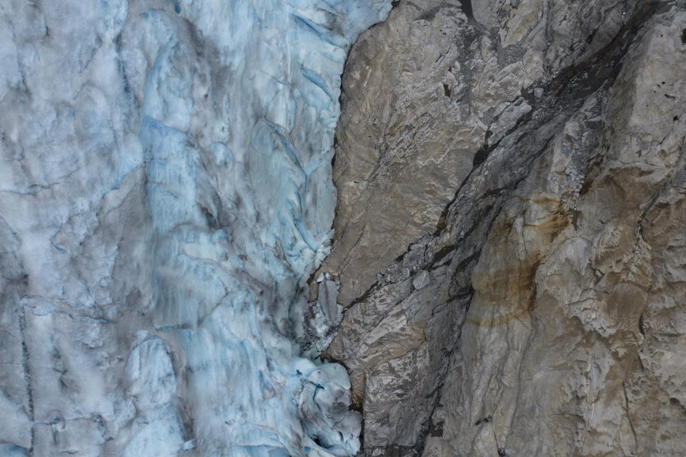 An aerial view of the Nigardsbreen glacier in Jostedal, Norway, on Aug. 5, 2022. The glacier has lost almost 3 kilometers (1.8 miles) in length in the past century due to climate change. (AP Photo/Bram Janssen)