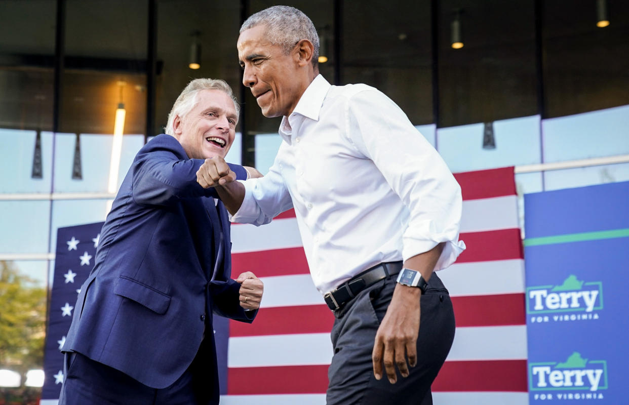 Image: Virginia Democratic gubernatorial candidate Terry McAuliffe welcomes former President Barack Obama during his campaign rally in Richmond, Va., on Oct. 23, 2021. (Kevin Lamarque / Reuters)