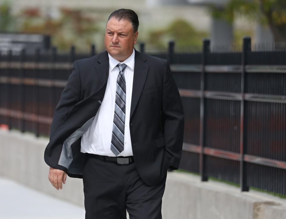 Former Irondequoit Police Chief Alan Laird heads into Federal Court for a plea hearing Tuesday, Sept. 12, 2023 in Rochester. 