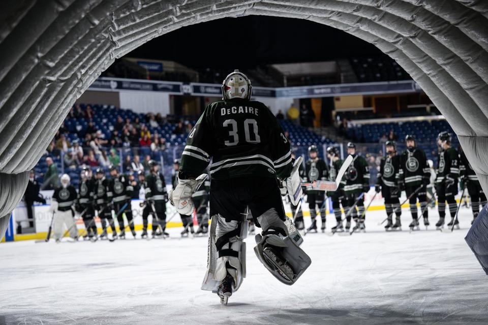 Grafton goalie Mason DeCaire takes the ice through the Railers tunnel Saturday at the DCU Center.