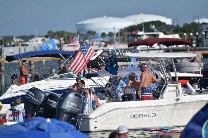 By land and sea, Blue Angels fans converge on Pensacola Beach on Friday morning ahead of the afternoon air show.