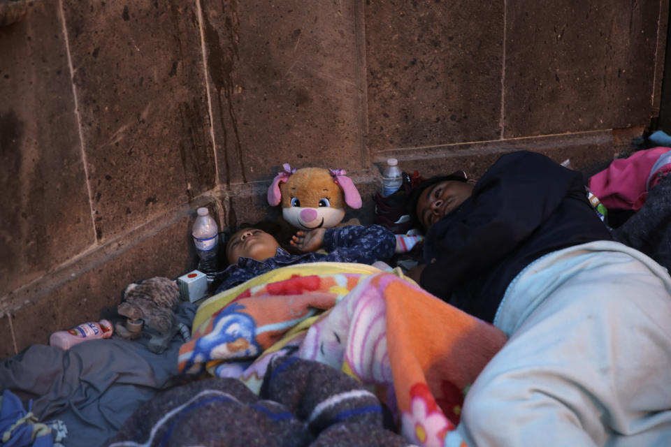 Migrants sleep under a gazebo at a park in the Mexican border city of Reynosa, Saturday, March 27, 2021. Dozens of migrants who earlier tried to cross into the U.S. in order to seek asylum have turned this park into an encampment for those expelled from the U.S. under pandemic-related presidential authority. (AP Photo/Dario Lopez-Mills)