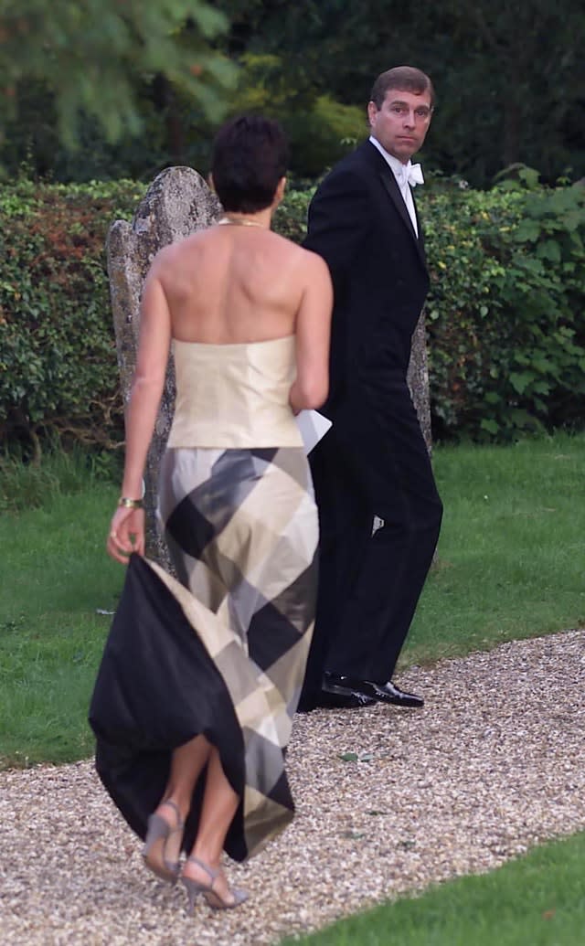 Ghislaine Maxwell in 2000 with the Duke of York leaving the wedding of a former girlfriend of the duke