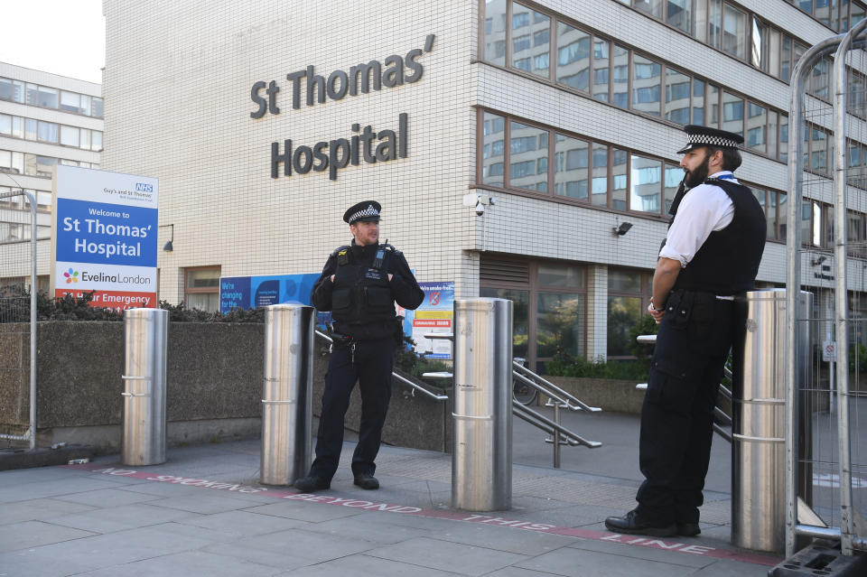 Police officers outside St Thomas' Hospital in Central London where Prime Minister Boris Johnson is in intensive care as his coronavirus symptoms persist.