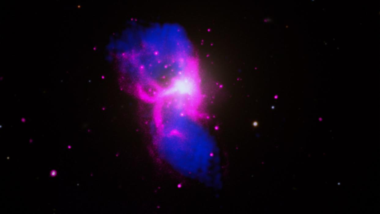  a cloud of bright purple gas in an H-shape 