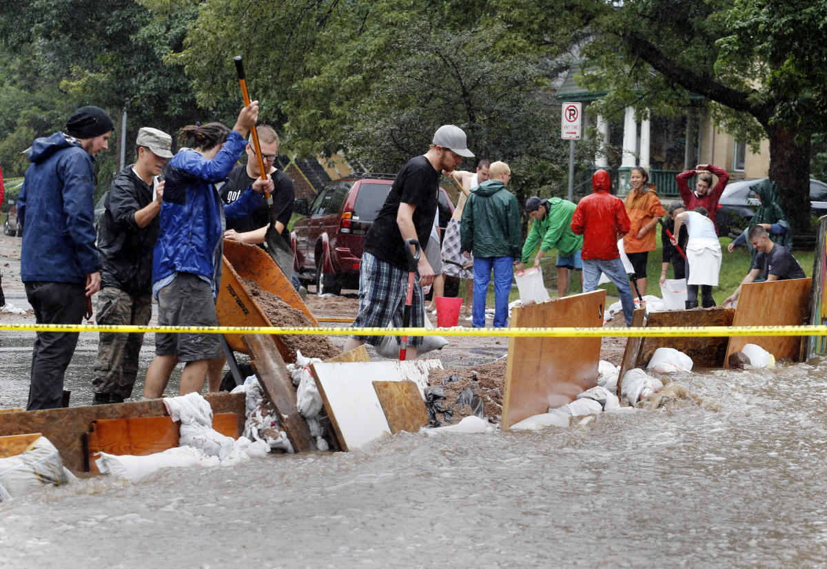 Four dead in Colorado flooding as rescues continue