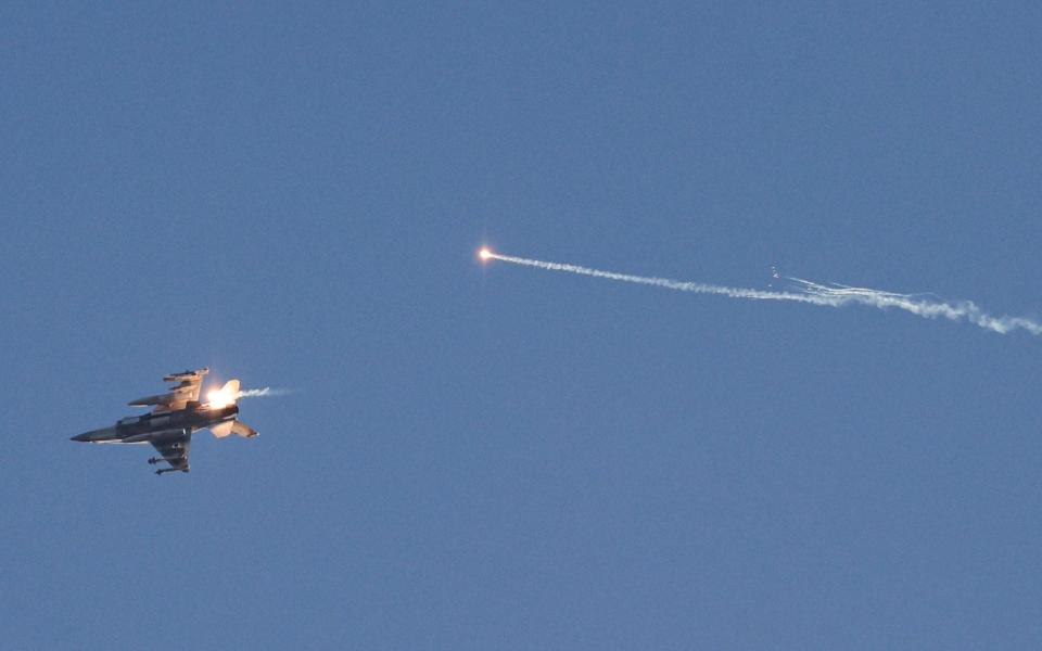 Israeli Air Force fighter jet firing flares above Lebanon's southern border on July 7