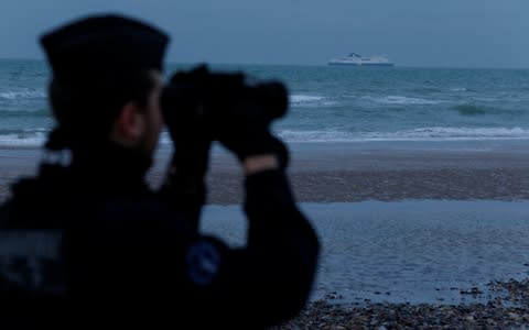 A French gendarme patrols the beach in Wissant - Credit: REUTERS/Pascal Rossignol