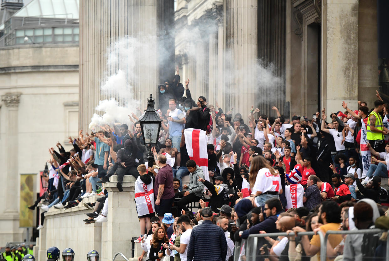 Fans on the steps of the National Gallery at Trafalgar Square, London before the UEFA Euro 2020 Final between Italy and England. Picture date: Sunday July 11, 2021.