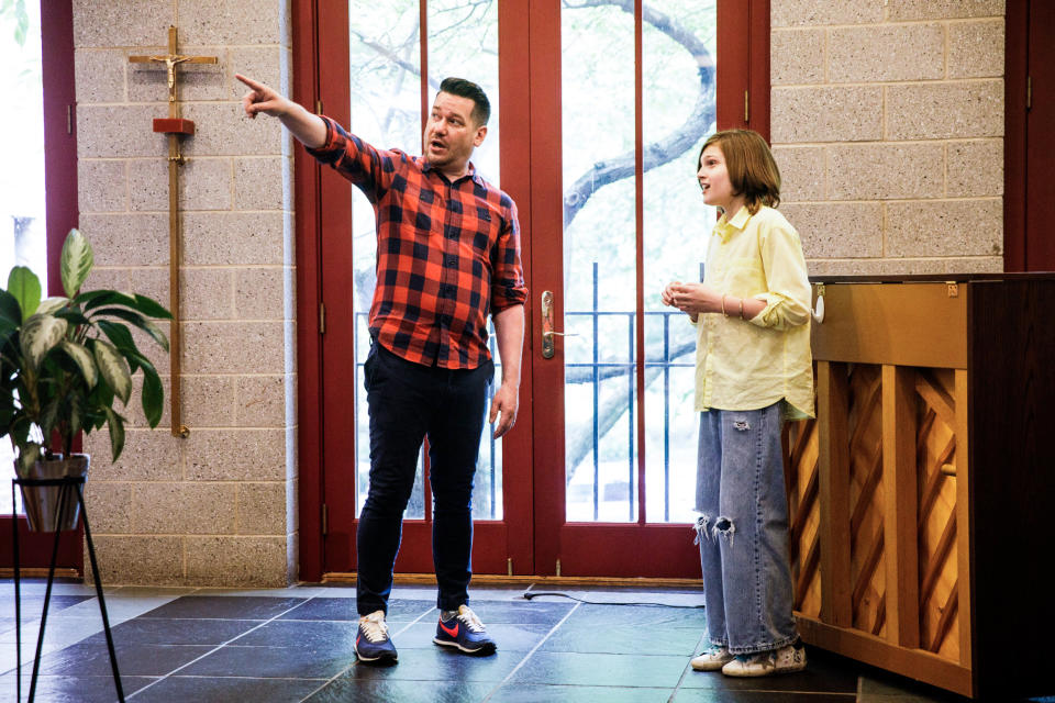 Steven Kroeze indicates where Michael Coppola should direct his voice during a vocal lesson at Trinity Lower East Side Lutheran Parish on May 28, 2022, in New York. (Julius Constantine Motal / NBC News)