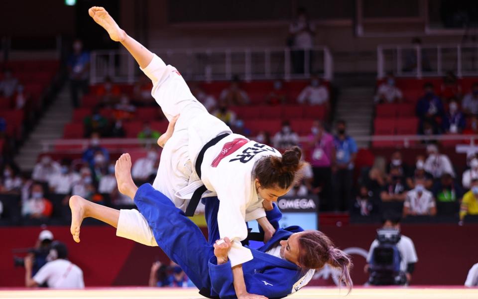  Chelsie Giles of Britain in action against Charline Van Snick of Belgium - REUTERS/Sergio Perez