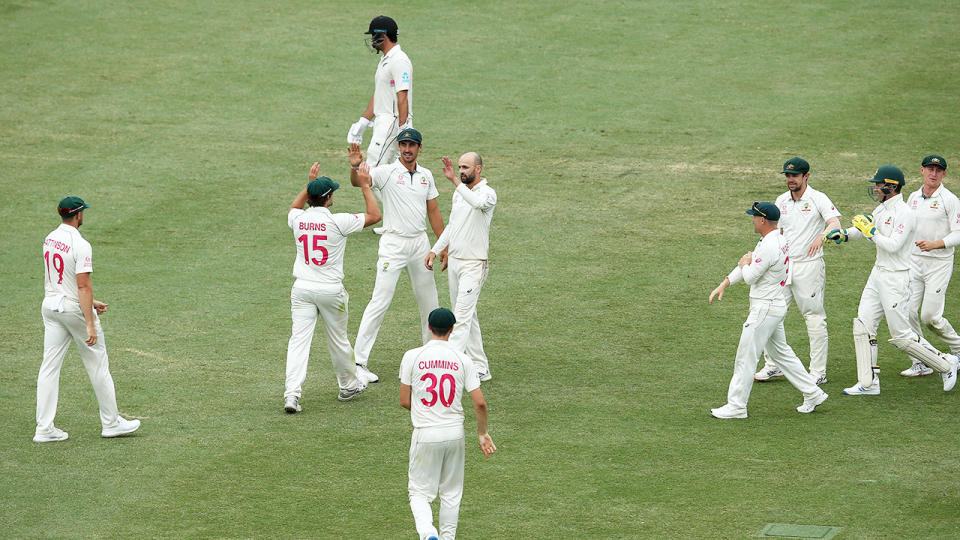 The Aussies celebrate after dismissing Colin de Grandhomme. (Photo by Jason McCawley - CA/Cricket Australia via Getty Images)