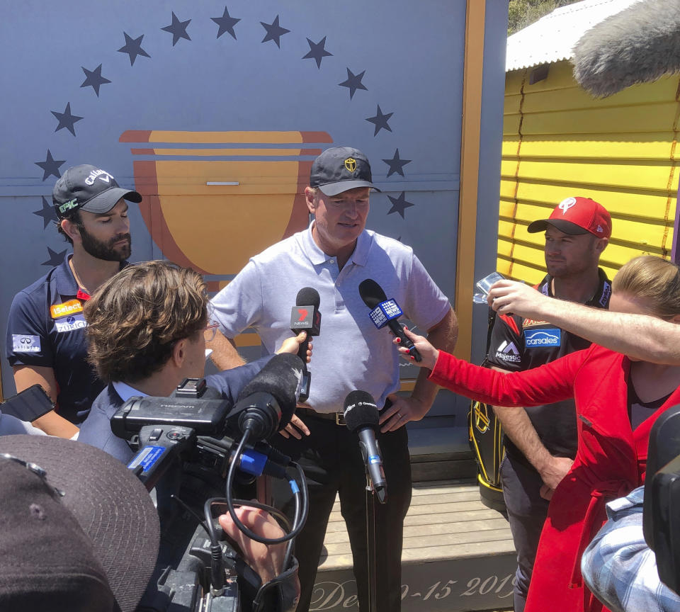 Ernie Els, captain of the International Team at next year's Presidents Cup, speaks to the media on the beach at Brighton in Melbourne, Australia, Monday, Nov. 26, 2018. Els came into Melbourne to help promote the tournament which will be held at Royal Melbourne in December 2019 for the third time. (AP Photo/Dennis Passa)