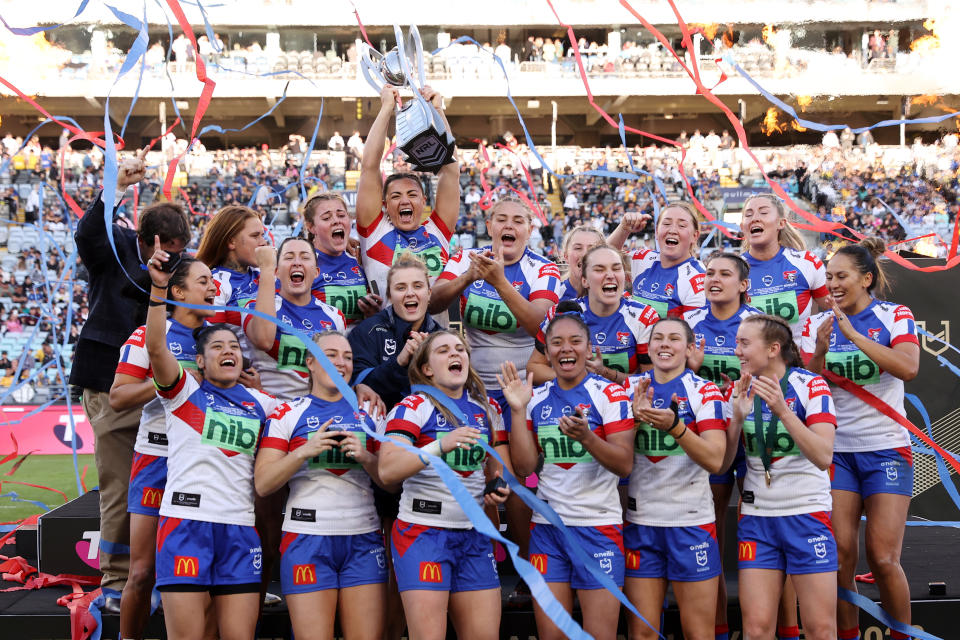 Seen here, The Newcastle Knights celebrating their NRLW grand final win in 2022. 