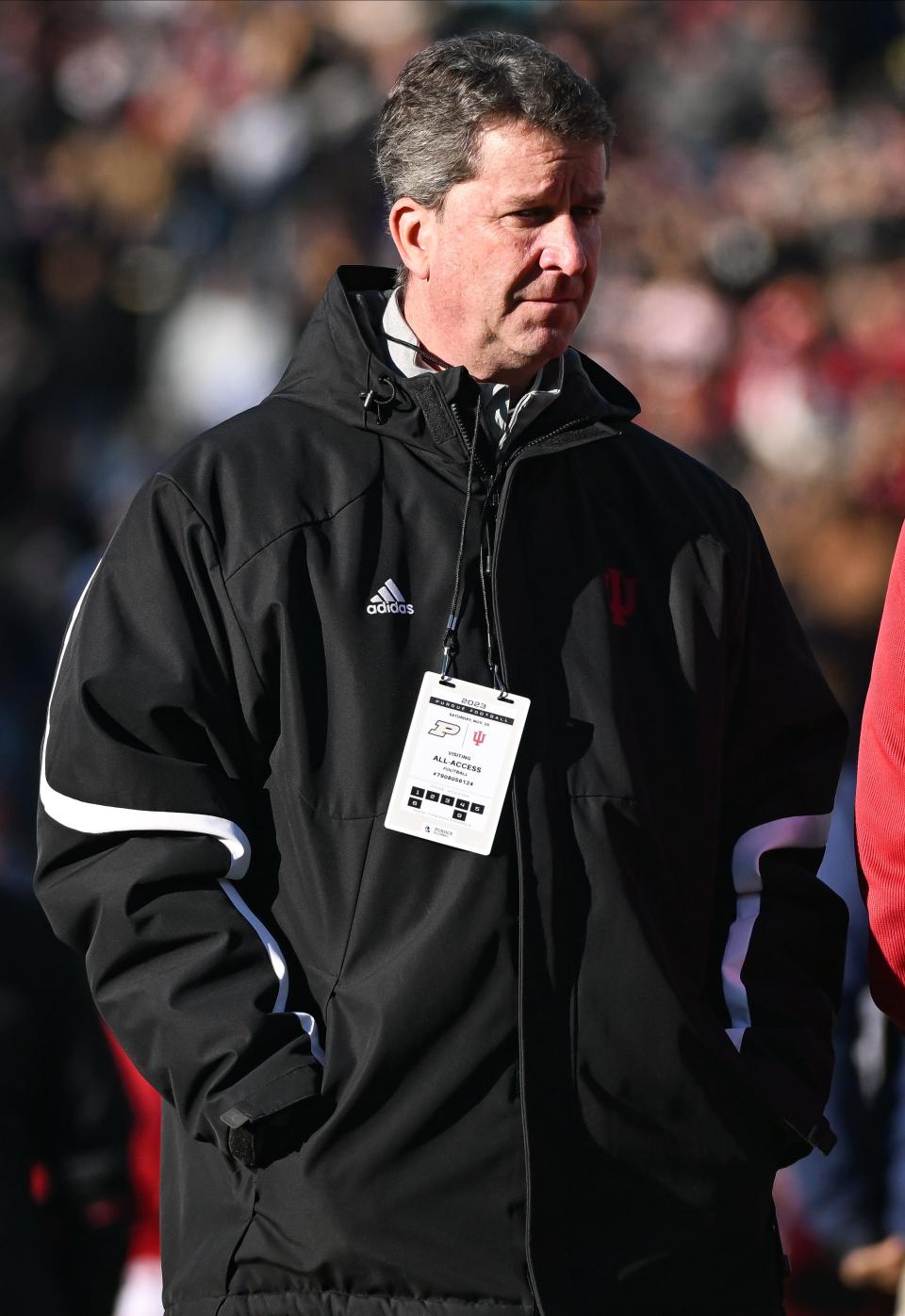 Indiana athletic director Scott Dolson walks along the sideline during the second half, Nov 25, 2023 at Ross-Ade Stadium.