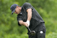 Brooks Koepka hits his tee shot on the fourth hole during the third round of the PGA Championship golf tournament at Oak Hill Country Club on Saturday, May 20, 2023, in Pittsford, N.Y. (AP Photo/Eric Gay)