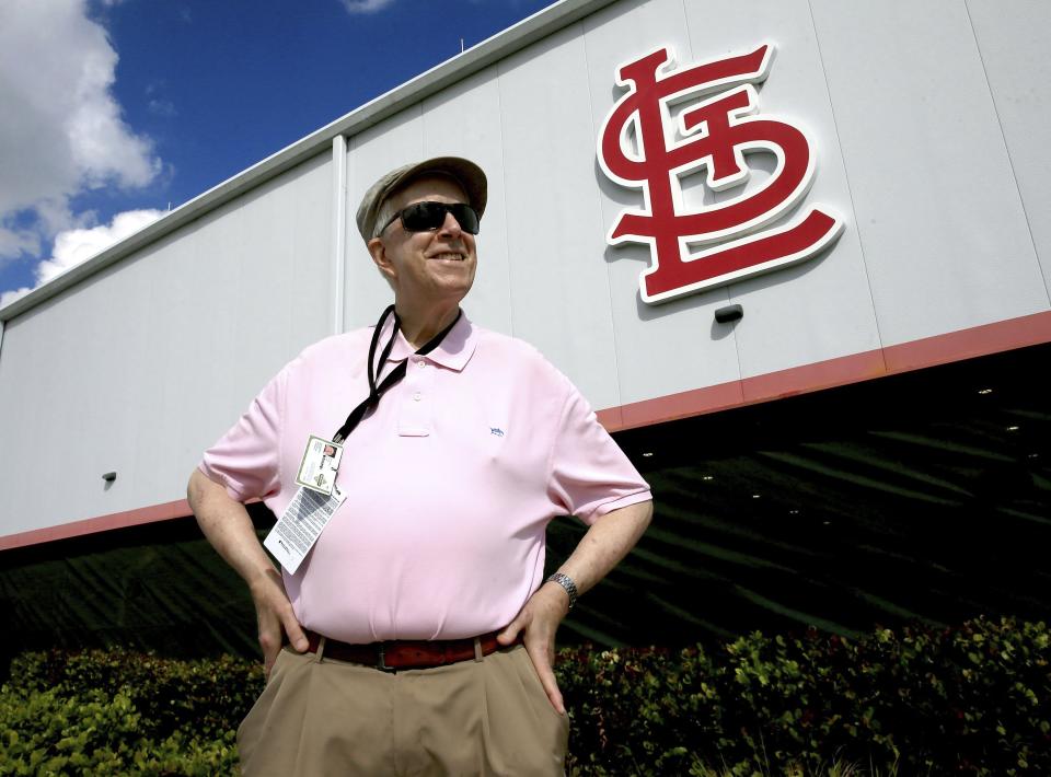 Baseball Hall of Famer and retired St. Louis Post-Dispatch baseball writer Rick Hummel stands for a portrait at the St. Louis Cardinals spring training complex in Jupiter, Fla., on Wednesday, Feb. 22, 2023. Hummel, an esteemed writer who covered the St. Louis Cardinals and Major League Baseball for five decades for the Post-Dispatch until his retirement in 2022, died Saturday, May 20, 2023, after a short, unspecified illness the Post-Dispatch said Monday. He was 77. (David Carson/St. Louis Post-Dispatch via AP)