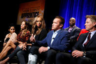 Host Arnold Schwarzenegger (4th L) and cast members (L-R) Nicole Polizzi, Brooke Burke-Charvet, Tyra Banks, Ricky Williams, and Patrick Knapp Schwarzenegger participate in a panel for "The New Celebrity Apprentice" in Universal City, California, December 9, 2016. REUTERS/Danny Moloshok