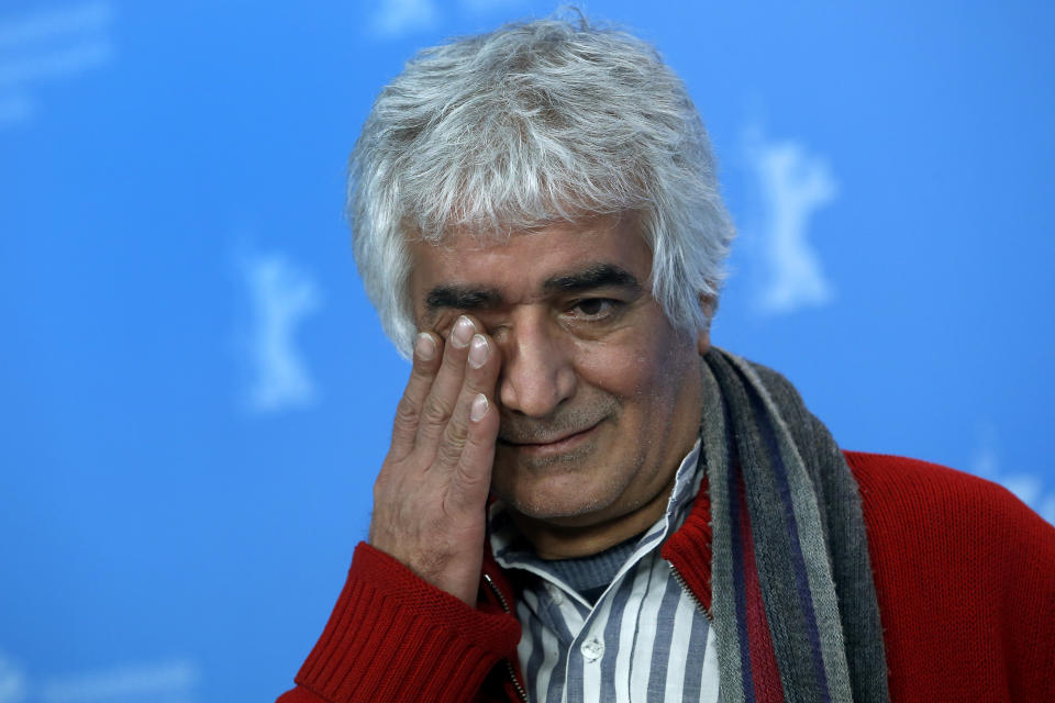 Co-director Kamboziya Partovi gestures during the photo call of the film Closed Curtain at the 63rd edition of the Berlinale, International Film Festival in Berlin, Germany, Tuesday, Feb. 12, 2013. (AP Photo/Michael Sohn)
