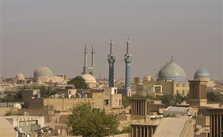 Mosques are pictured in the skyline of Yazd, 700 km (435 miles) south of Tehran, October 15, 2008. REUTERS/Caren Firouz